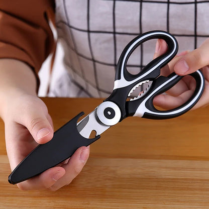 Wukusy 3-in-1 kitchen tool with stainless steel vegetable, fruit, cheese, meat slicer, seafood scissors, and bottle opener in a single device