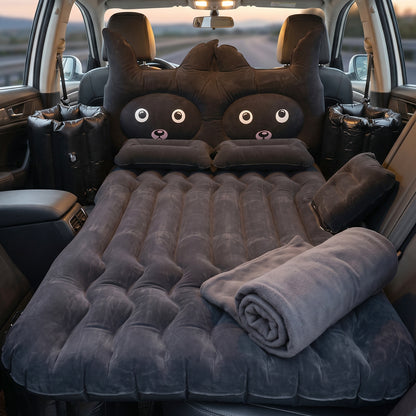 Wukusy cute car air mattress set with black cat pillow for comfortable on-the-go sleeping, shown in a car interior.