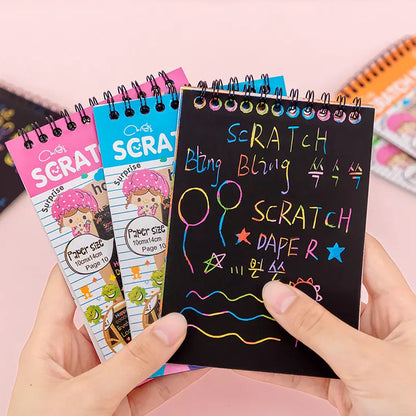 Wukusy 4609 Crafts Rainbow Art Scratch Paper Book with 10 colorful pages for kids' creative arts and crafts activities.