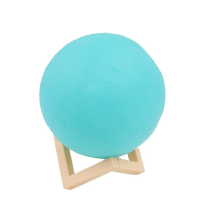 Blue Moon Night Lamp by Wukusy with plastic stand, 15x12 cm, ideal for home decor and ambient lighting.