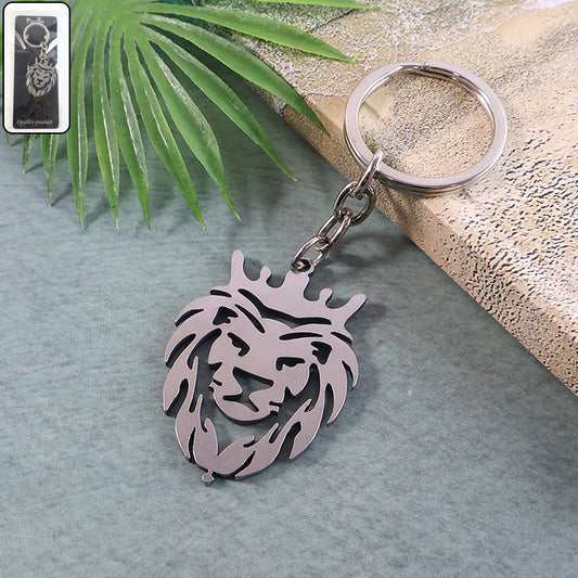 Metal lion head keychain by Wukusy showing a detailed lion's face and mane against a neutral background.