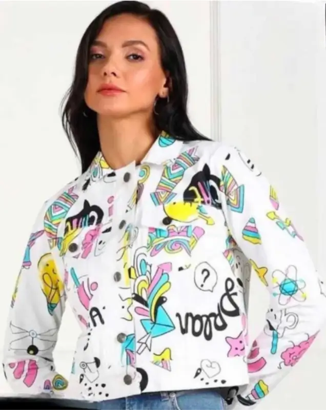 Women’s printed denim jacket by Ekom featuring casual style and colorful printed design, shown on a woman wearing it outdoors.