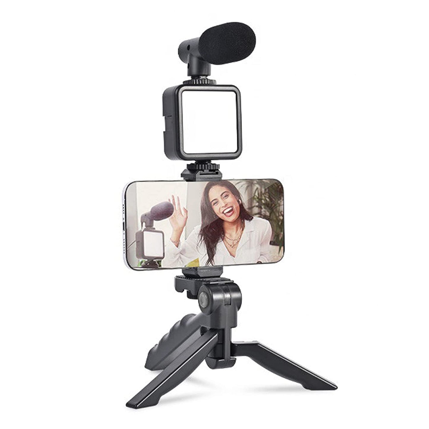 Wukusy 6054 vlogging kit with mini tripod, LED light, phone holder clip, and microphone for mobile video creation.