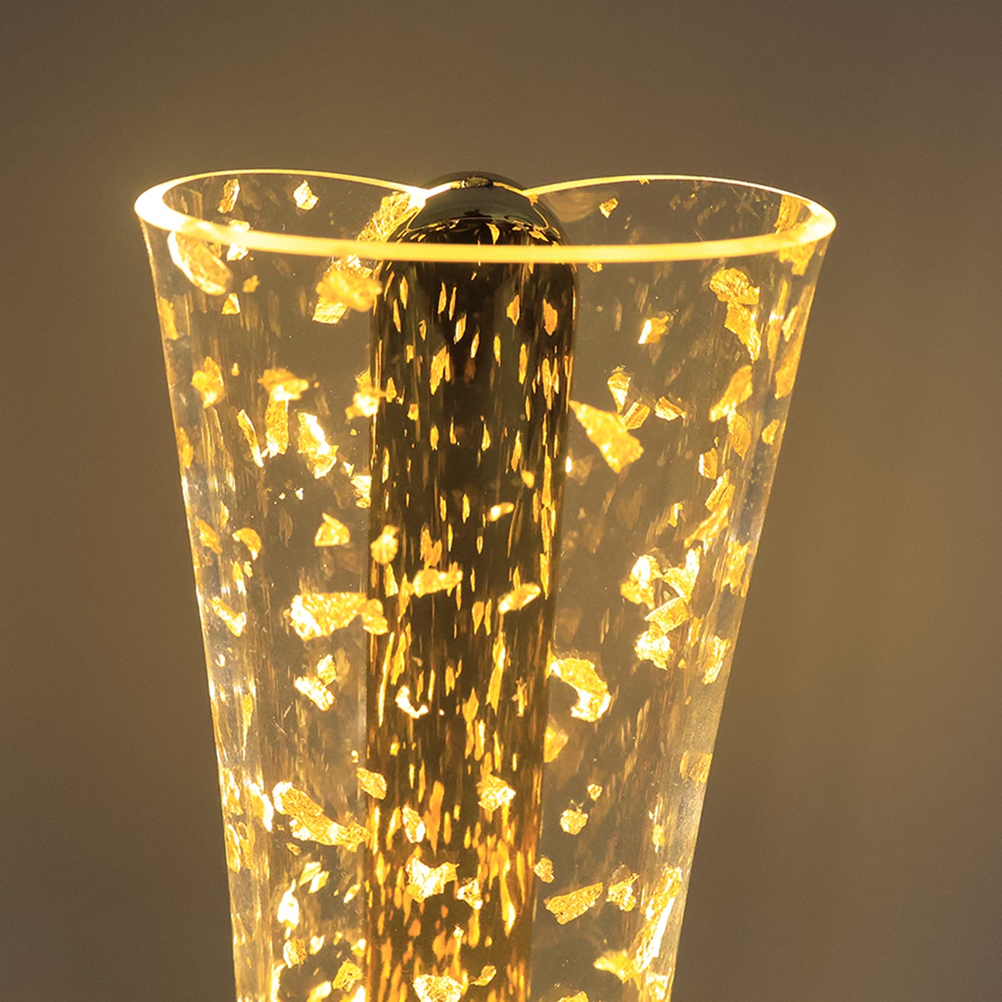 Luxury Golden Crystal LED Table Lamp by Wukusy featuring a shimmering crystal design and warm lighting on a sleek surface.