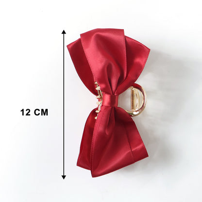 Elegant satin bow hair claw clip for women by Wukusy, featuring a smooth satin finish and stylish design.