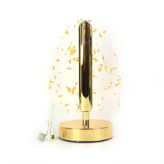 Golden crystal leaf-shaped LED table lamp by Wukusy, elegant home decor piece with intricate leaf design and warm glow.