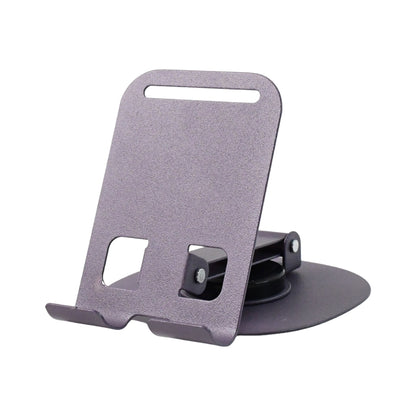 Foldable Wukusy mobile stand with 360-degree rotation, shown in a compact, foldable design for hands-free device use.