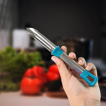 Wukusy Apex Premium stainless steel vegetable and fruit peeler with ergonomic handle on a kitchen countertop
