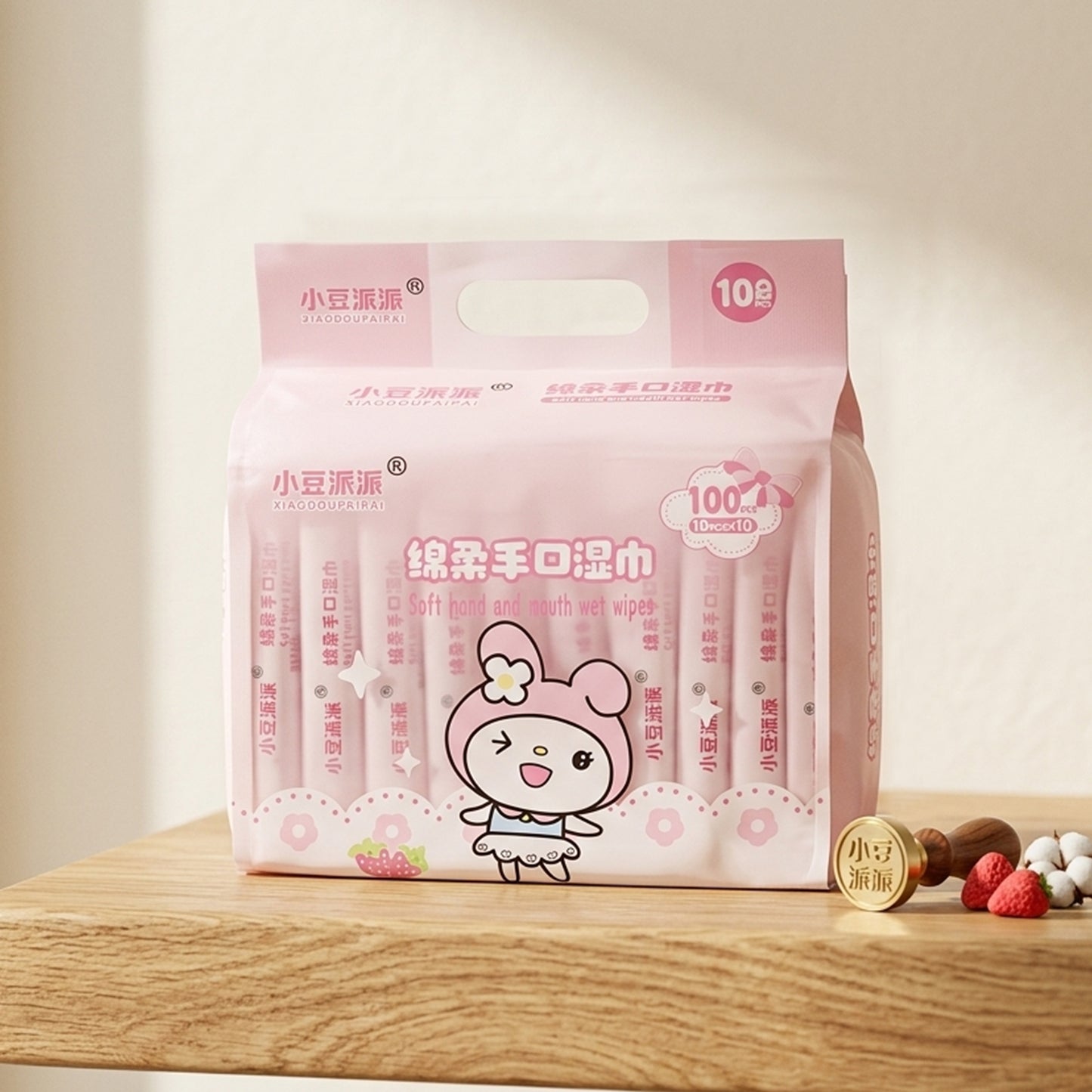 Cartoon printed soft wet wipes pack by Wukusy, 100 count, featuring colorful character designs on each pack.