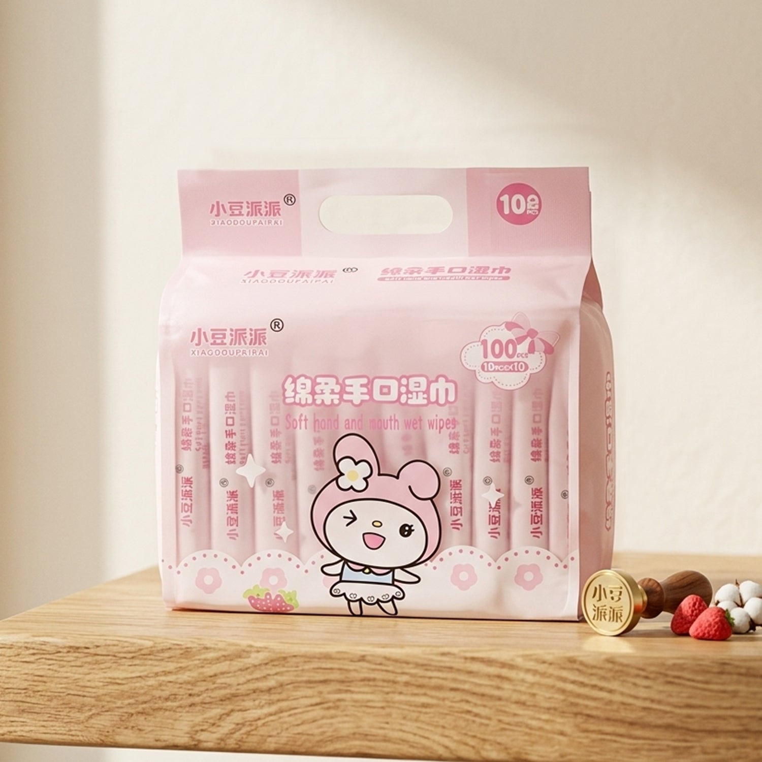 Cartoon printed soft wet wipes pack by Wukusy, 100 count, featuring colorful character designs on each pack.