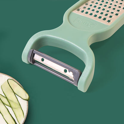Wukusy Apex 2-in-1 vegetable grater and peeler combo tool for kitchen prep, with stainless steel blades and ergonomic handle.
