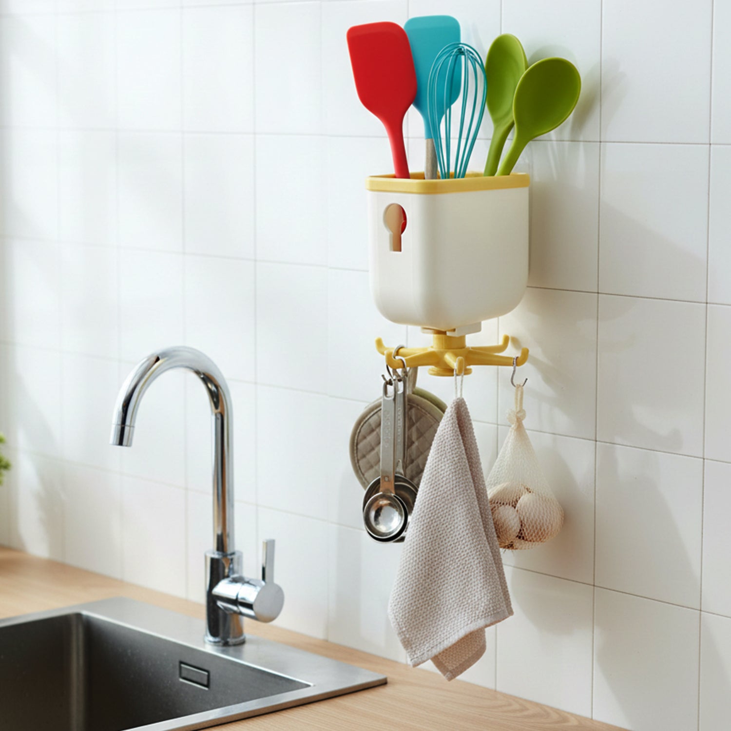 Heavy-duty Wukusy 360° rotating wall hook with sticky adhesive for secure storage and versatile hanging options.