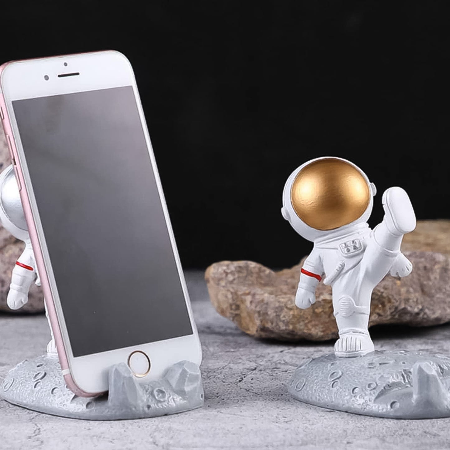 Wukusy astronaut-themed 3D planet mobile phone holder stand, creative space-inspired phone accessory with fun design.