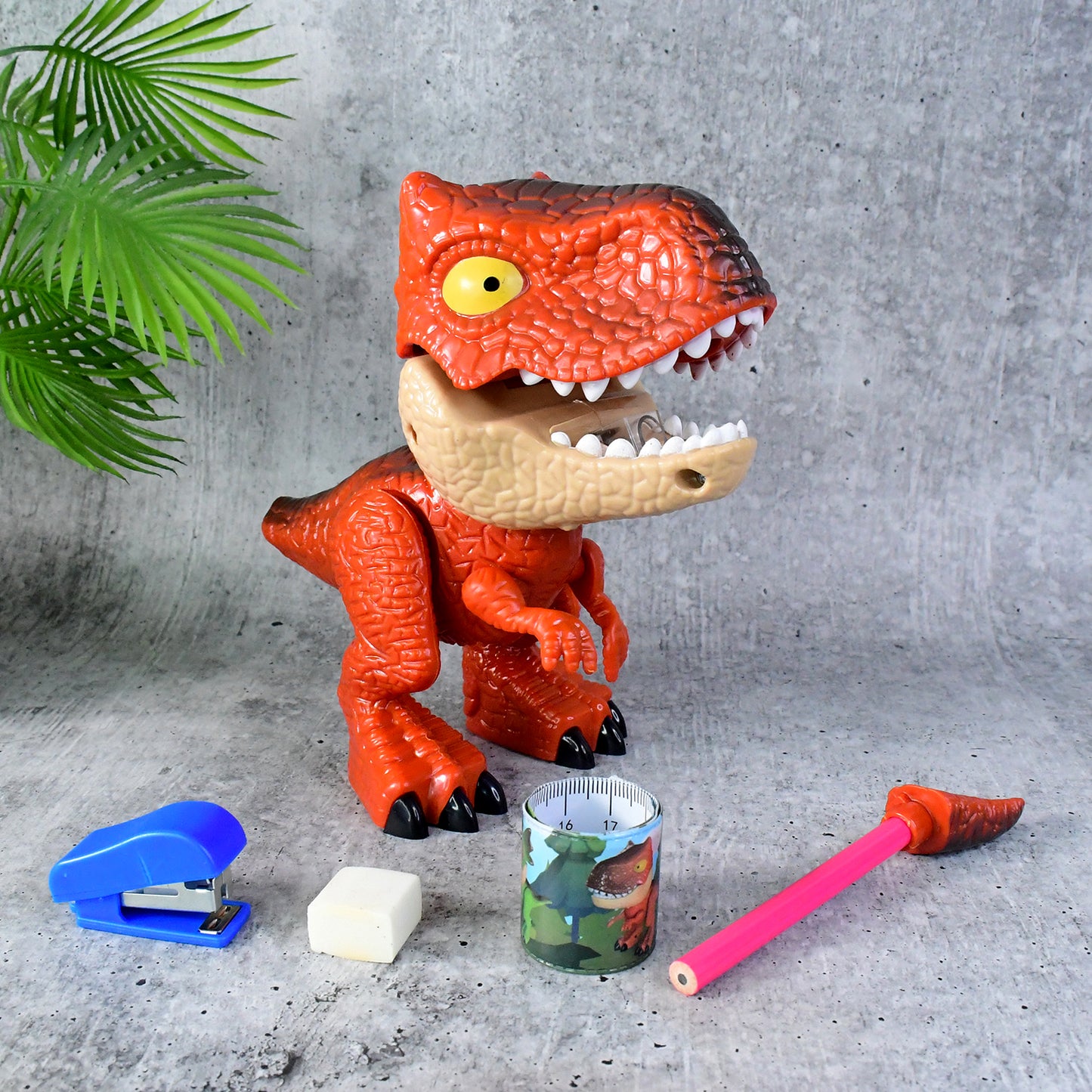 Colorful dinosaur-shaped stationery gift set for kids by Wukusy, includes pens, notebooks, and fun dinosaur-themed writing accessories.