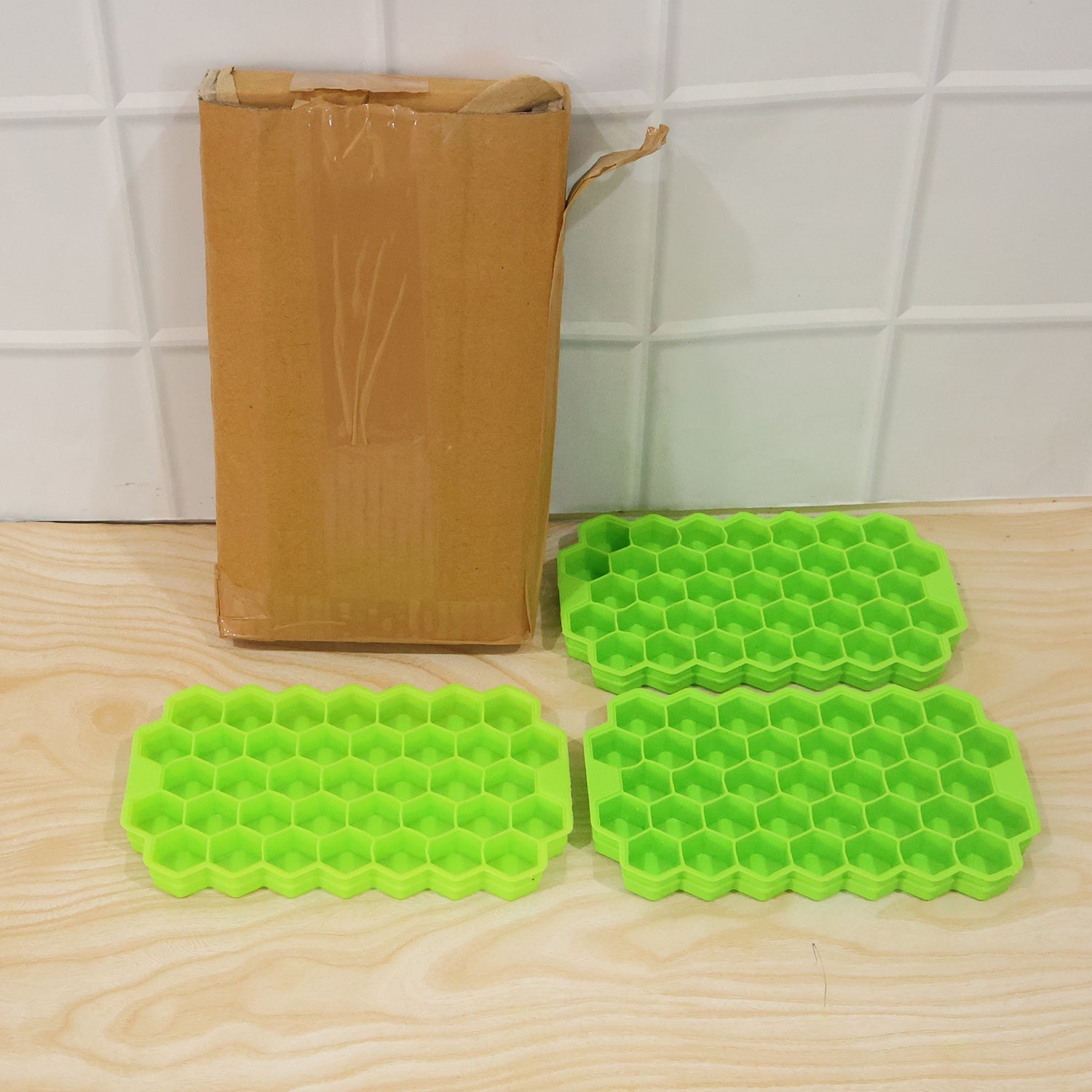 Wukusy silicone honeycomb ice cube tray with 37 cavities for making ice cubes, flexible and reusable kitchen mould.