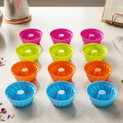 Wukusy reusable silicone cupcake mould set with 12 colorful flexible baking cups on a white background.