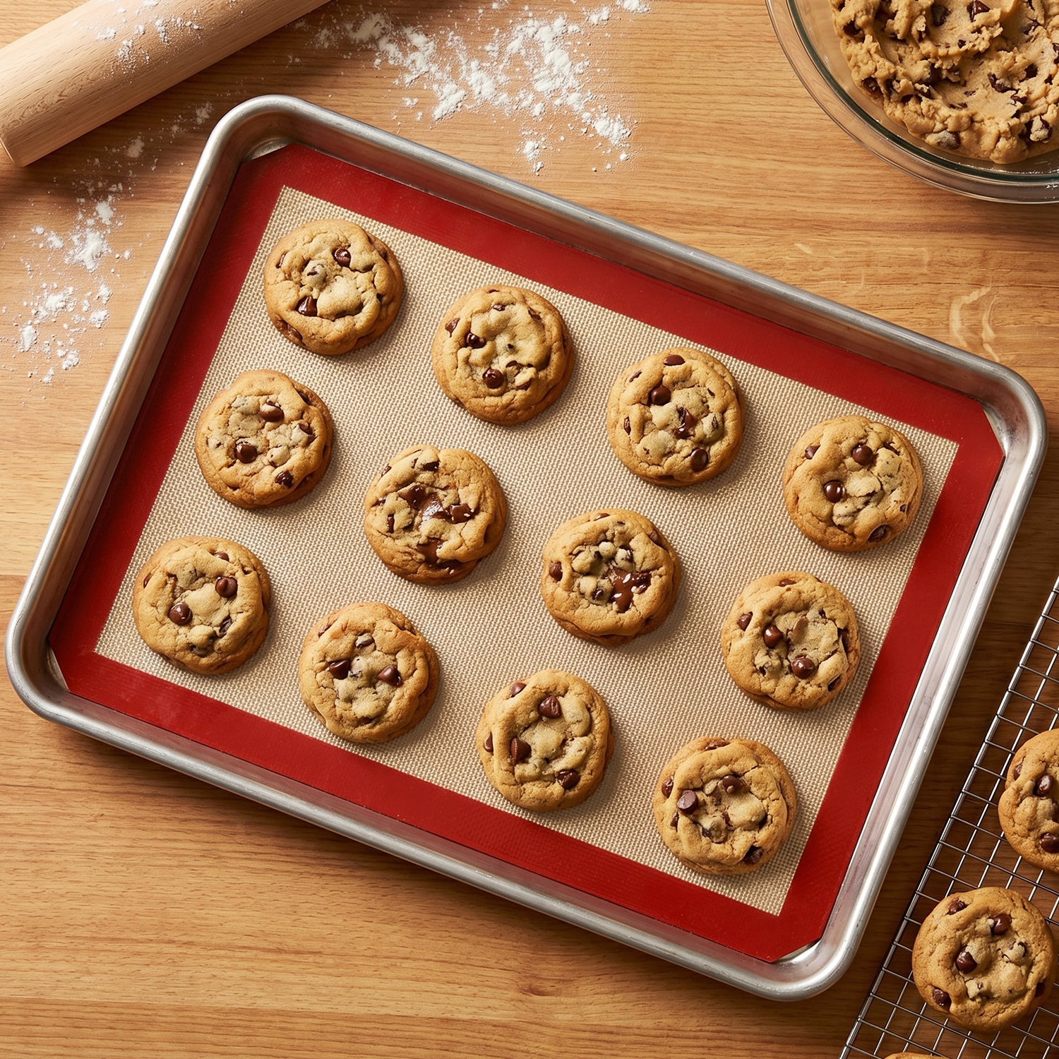 Wukusy 5-piece non-stick silicone baking mat set for baking, roasting, and food prep on a kitchen countertop or baking sheet.