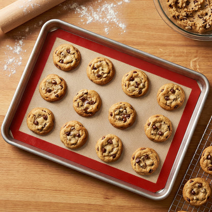 Wukusy 5-piece non-stick silicone baking mat set for baking, roasting, and food prep on a kitchen countertop or baking sheet.