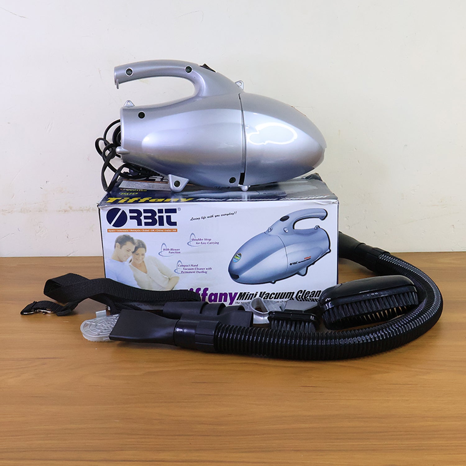 Wukusy Orbit High Power Handheld Mini Vacuum Cleaner with 800W motor, compact design, shown in black color.