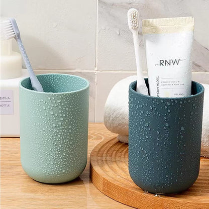 Wukusy multipurpose plastic wall mount toothbrush holder with two cups, ideal for bathroom organization and home improvement.