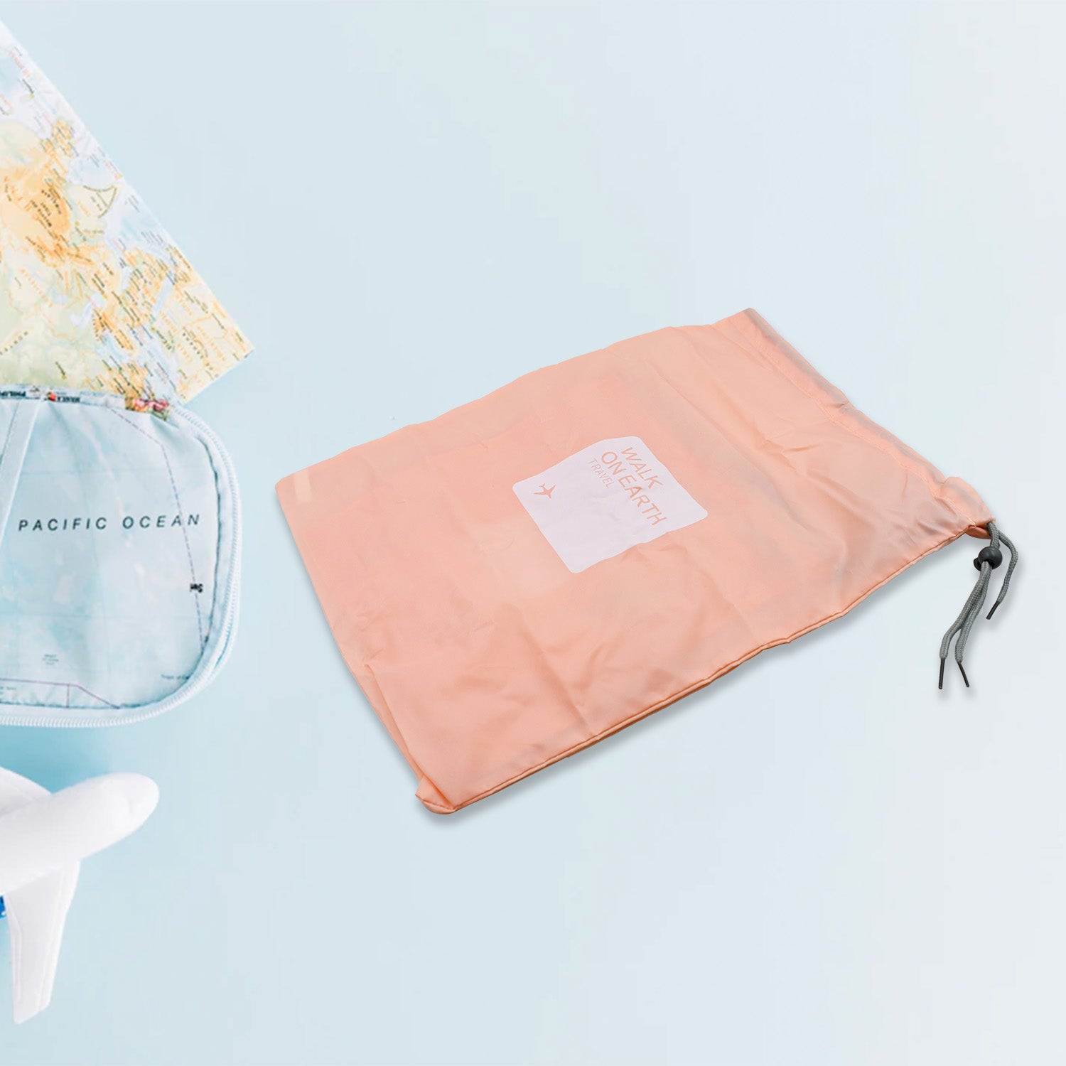 Wukusy 4-piece waterproof nylon travel storage bags with drawstrings for organizing clothes, shoes, and accessories in luggage.