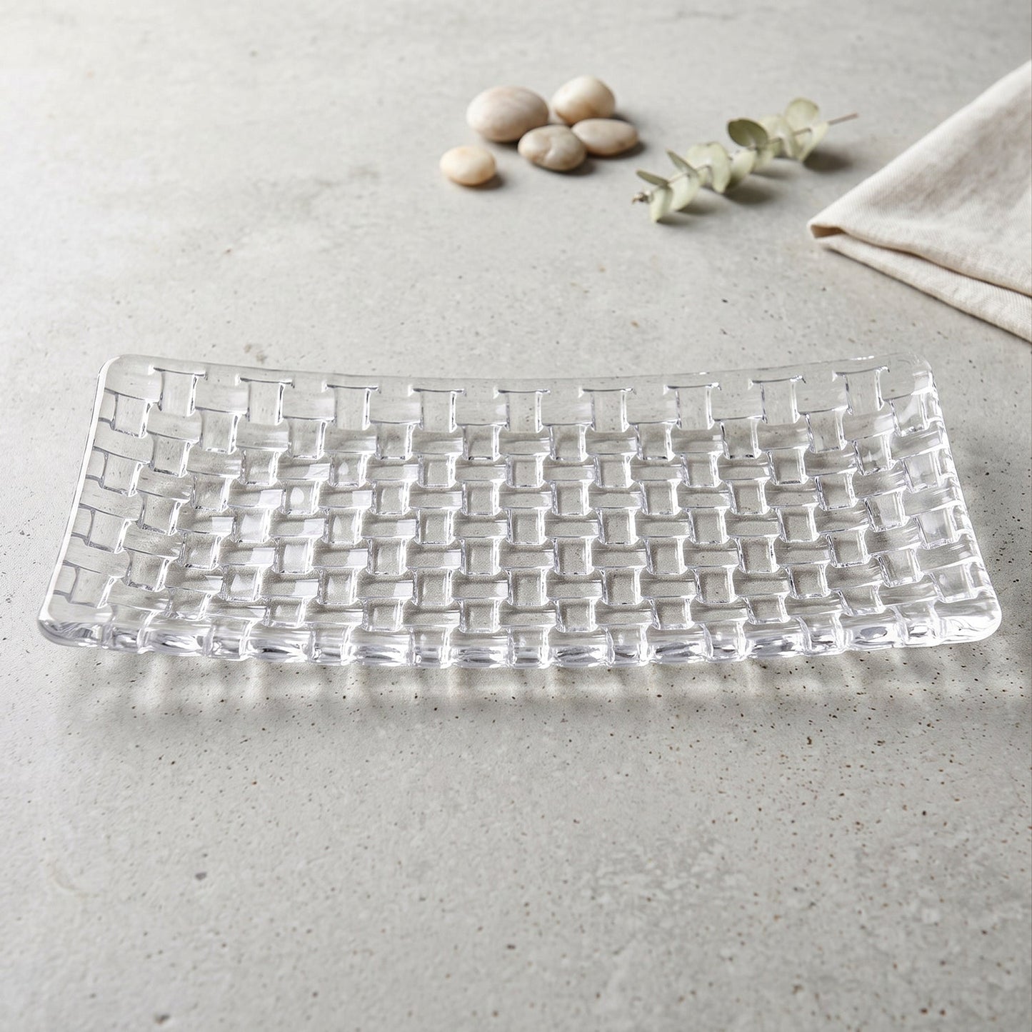 Clear glass 11-inch rectangular serving tray with basketweave design, ideal for serving appetizers or desserts.