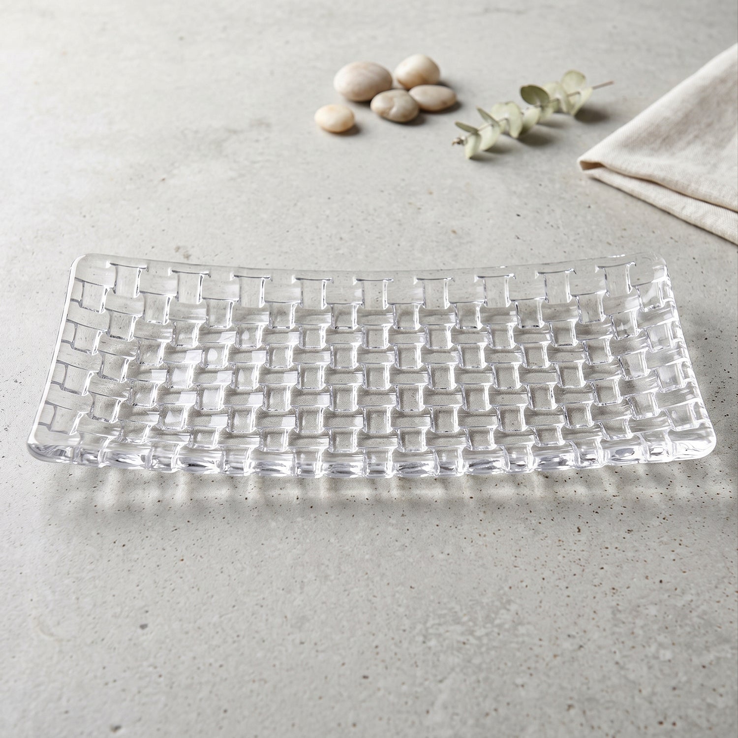 Clear glass 11-inch rectangular serving tray with basketweave design, ideal for serving appetizers or desserts.