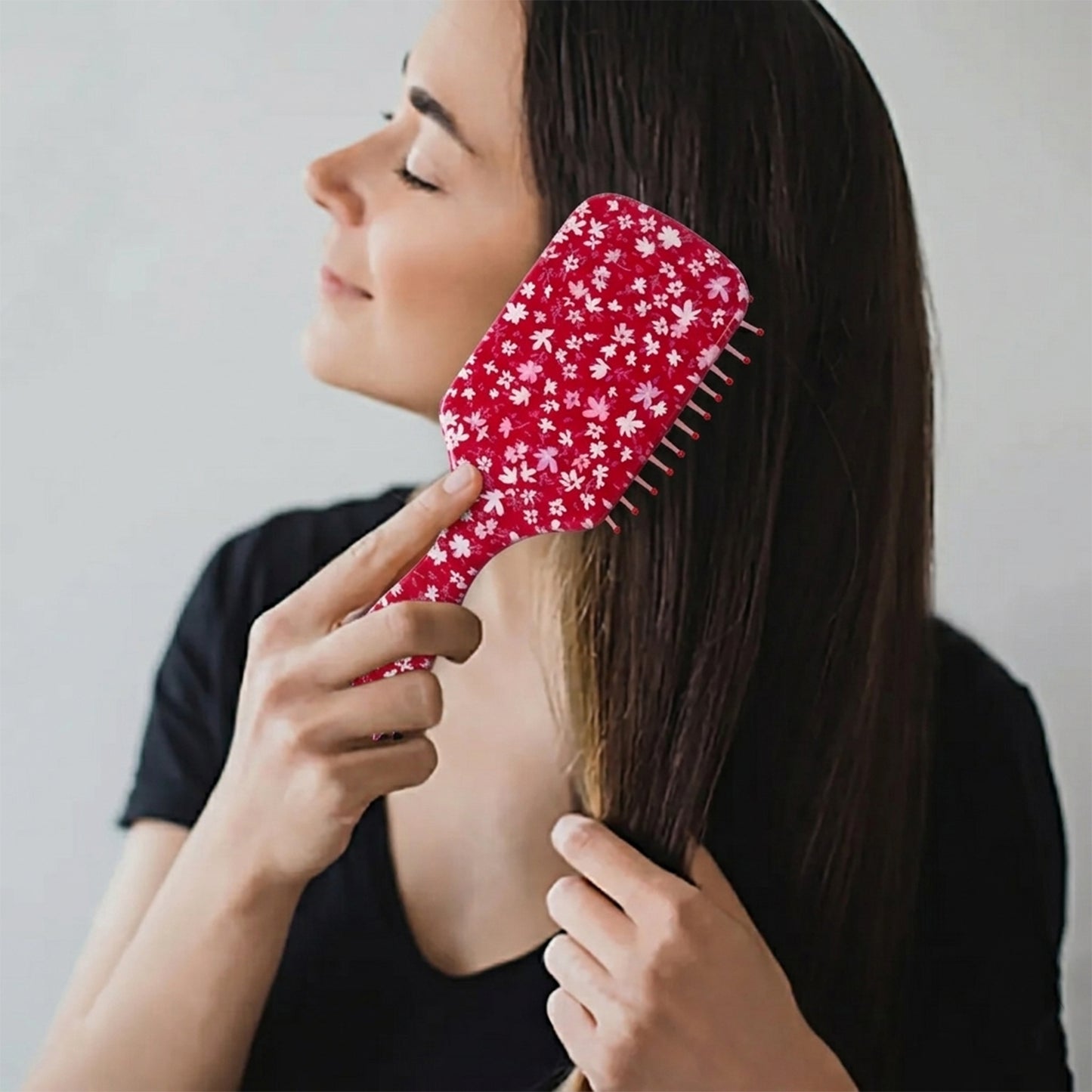 Colorful kids hair brush by Wukusy with fun mixed design, featuring soft bristles and vibrant patterns for children’s hair styling.