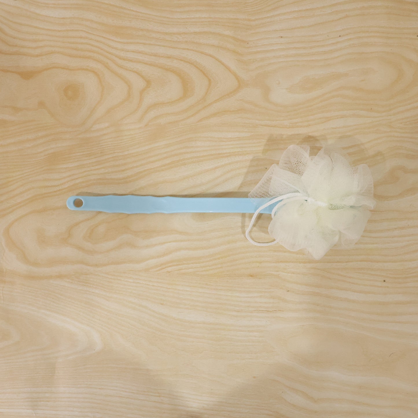 Wukusy long handle shower brush back scrubber with 33 cm handle for easy body cleansing and exfoliation.