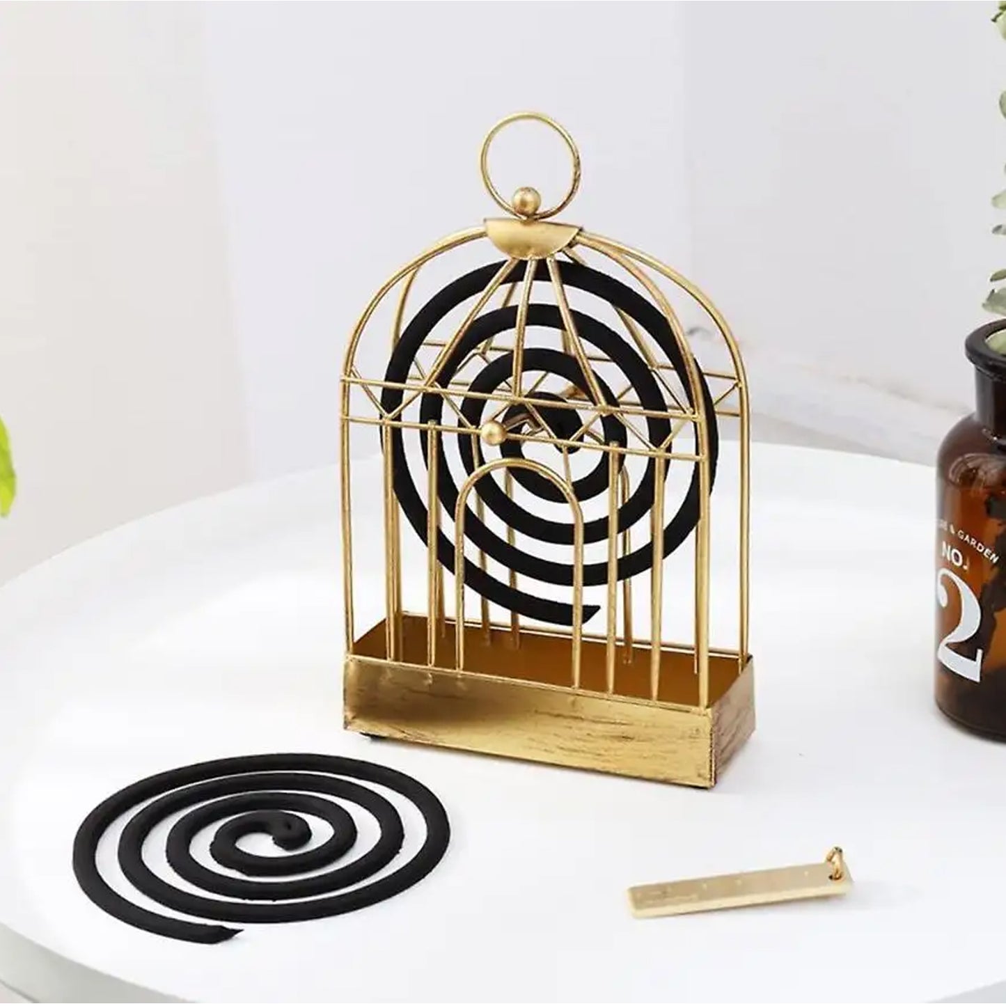 Vintage-style Wukusy mosquito coil holder stand for home and office, durable household mosquito stand with intricate design.