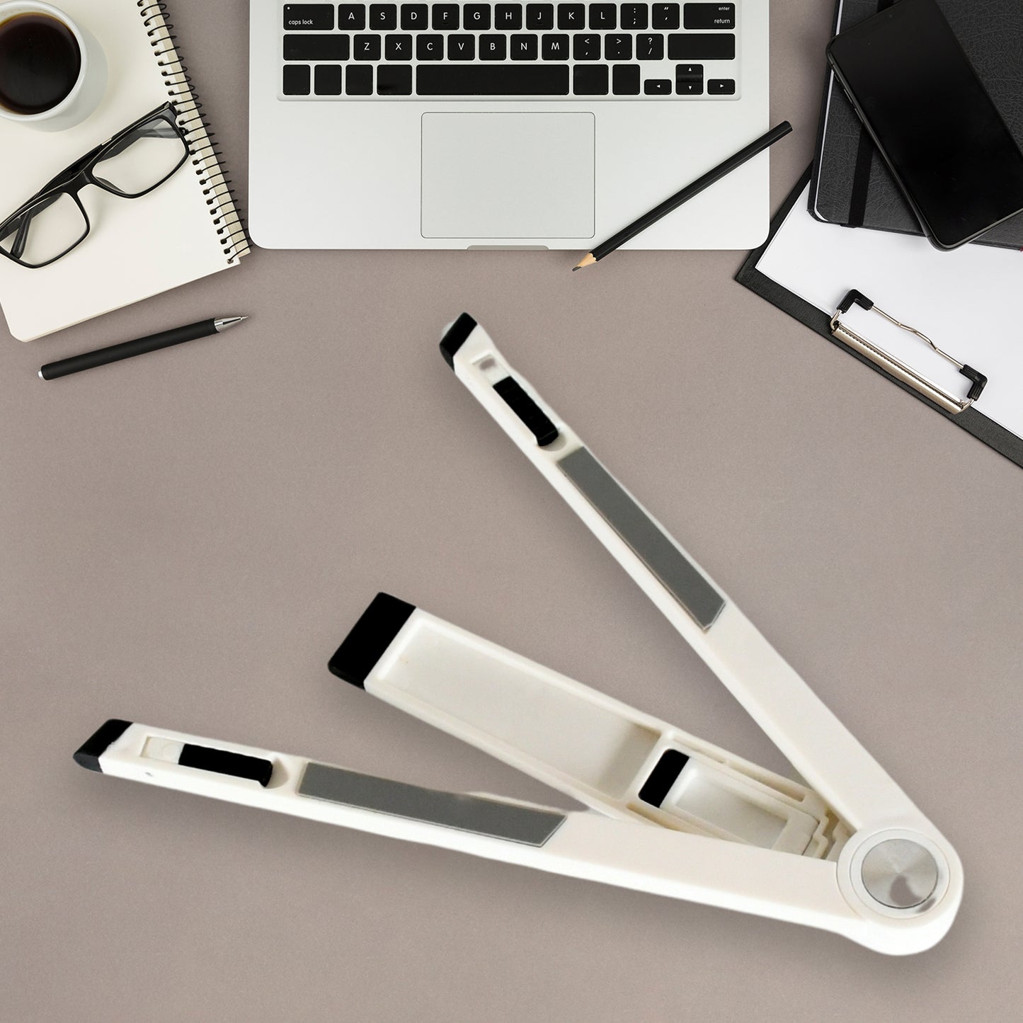 Wukusy Slim Tablet Mobile Stand, adjustable and foldable scaffold for holding tablets securely in landscape or portrait mode.