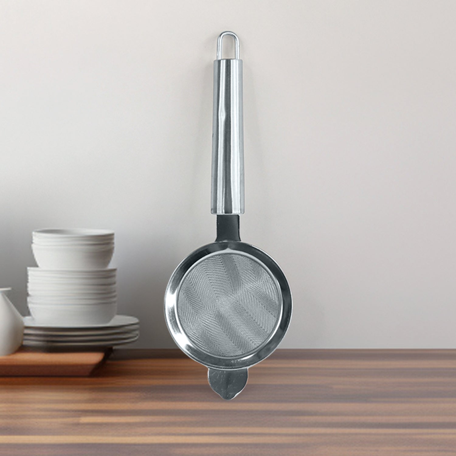 Wukusy Apex Premium Conical Tea Strainer with pipe handle for home and kitchen use, made of stainless steel.