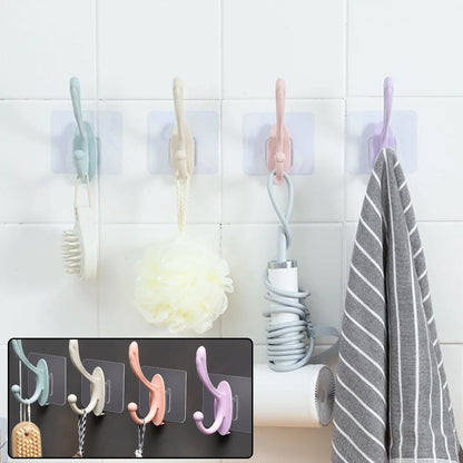 Wukusy 4687 self-adhesive plastic wall hook attached to a wall, ideal for home organization and hanging items.