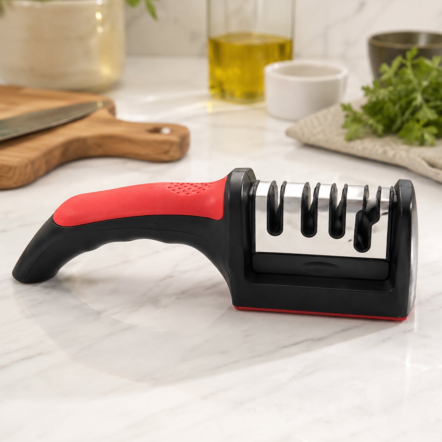 Wukusy 4-stage knife sharpener with non-slip handle, compact kitchen tool for sharpening and honing kitchen knives.