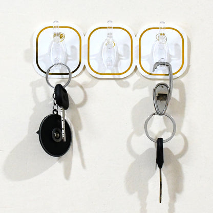 Set of six transparent adhesive wall hooks by Wukusy, ideal for home improvement and hanging lightweight items.