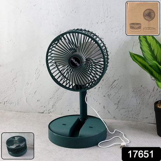 Wukusy foldable mini desk fan with adjustable height and angle, compact and portable for home or office use.