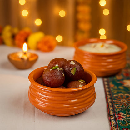 Wukusy classic terracotta-style Handi bowl for home and kitchen use, showcasing its rustic design and durable ceramic material.