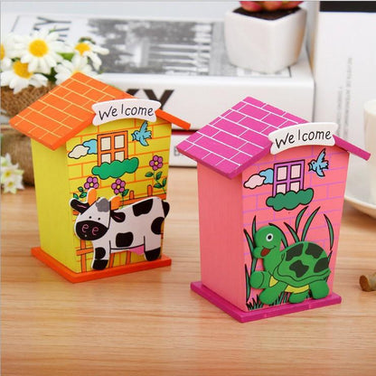 Cute cartoon house-shaped wooden piggy bank by Wukusy, featuring a charming house design for saving coins.