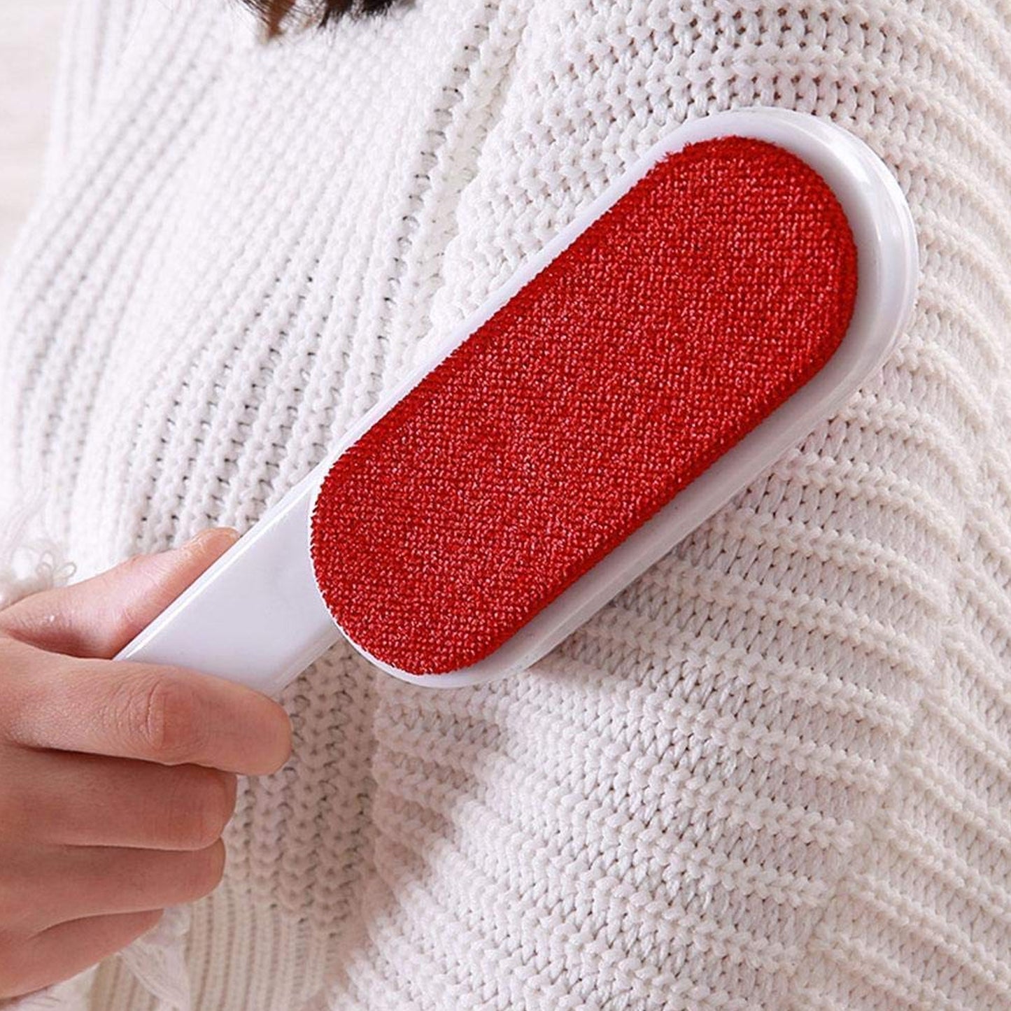 Wukusy 6196 pet hair remover with double-sided self-cleaning design and reusable surface for removing pet fur from furniture and clothing.