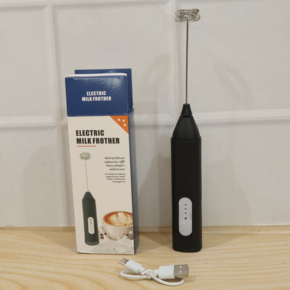 Wukusy handheld electric milk frother and coffee foam maker with stainless steel whisk for creating frothy drinks.