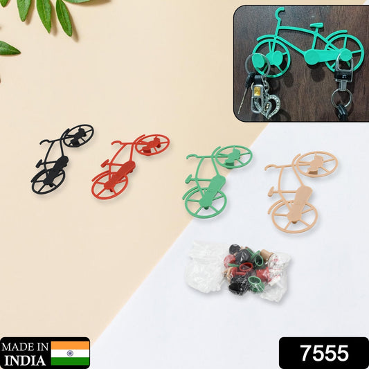 Set of four Wukusy bicycle-shaped plastic key chain holders with wall mounts, ideal for organizing keys at home or office.