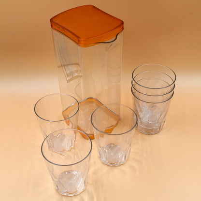 Wukusy 2246 resistant glass jug for juice, milk, or hot and cold beverages, clear kitchen tool with handle and spout.