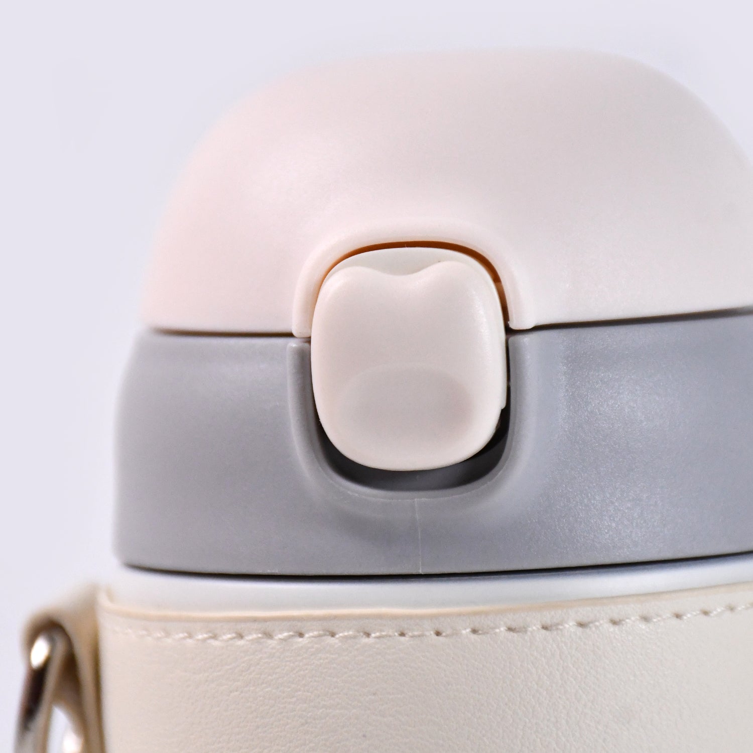 Stainless steel Wukusy 350ml insulated coffee and tea bottle with lid, designed for hot and cold beverages, on white background.