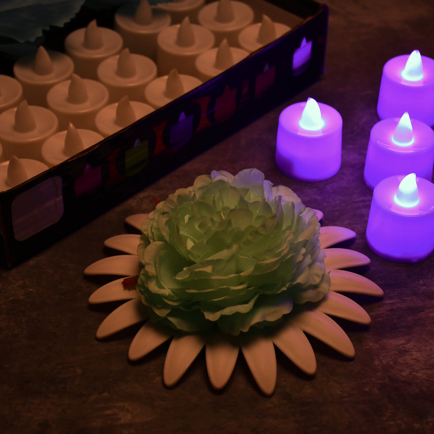 Set of 24 pink flameless LED tealights by Wukusy, smokeless plastic decorative candles for home decor, safe and realistic lighting.