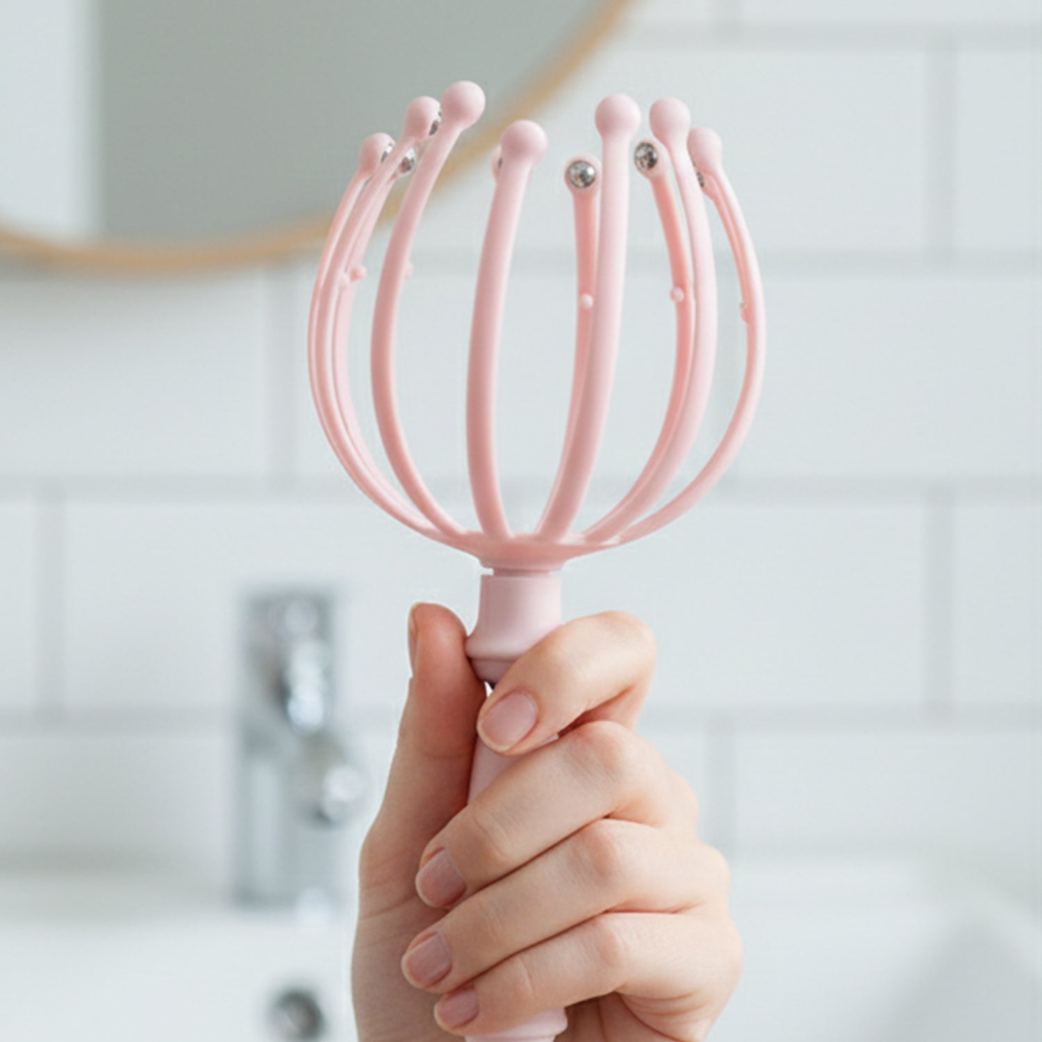 Wukusy manual scalp massager with rolling ball tips for relaxing scalp massage and tension relief.