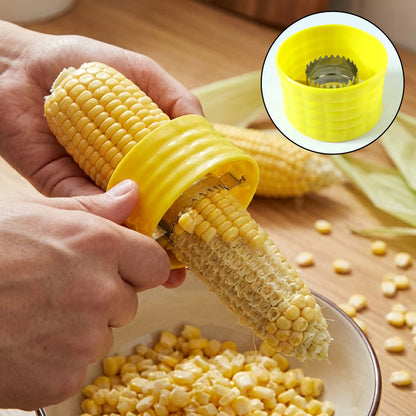 Wukusy handheld corn kernel stripper and peeler tool showing the stainless steel blade and ergonomic handle for easy corn removal