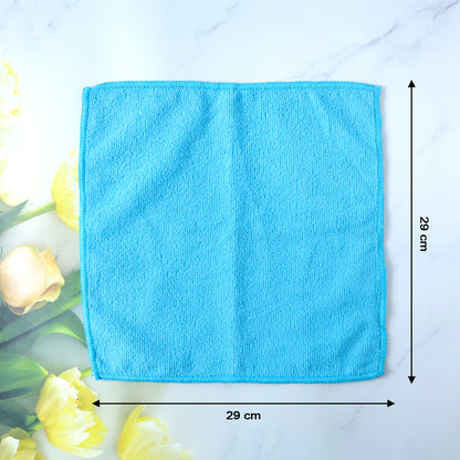 Set of four Wukusy microfiber cleaning cloths, versatile towels for dusting, wiping, and general cleaning tasks.