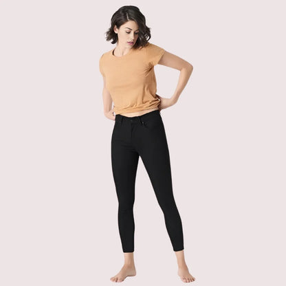 Women's sleek silhouette black skinny fit jeans by Snazzyway, shown on a model highlighting the slim fit and stylish design.