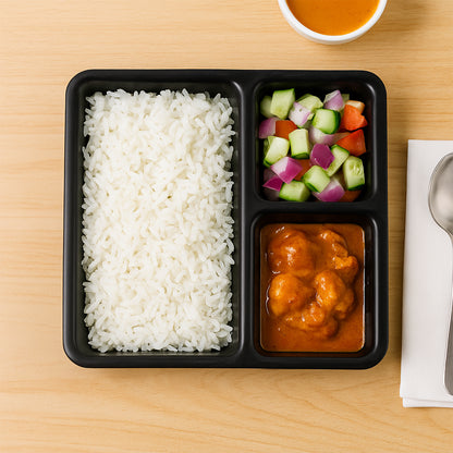 Black Wukusy plastic multi-compartment meal serving tray with three sections, rectangular design, ideal for home dining.
