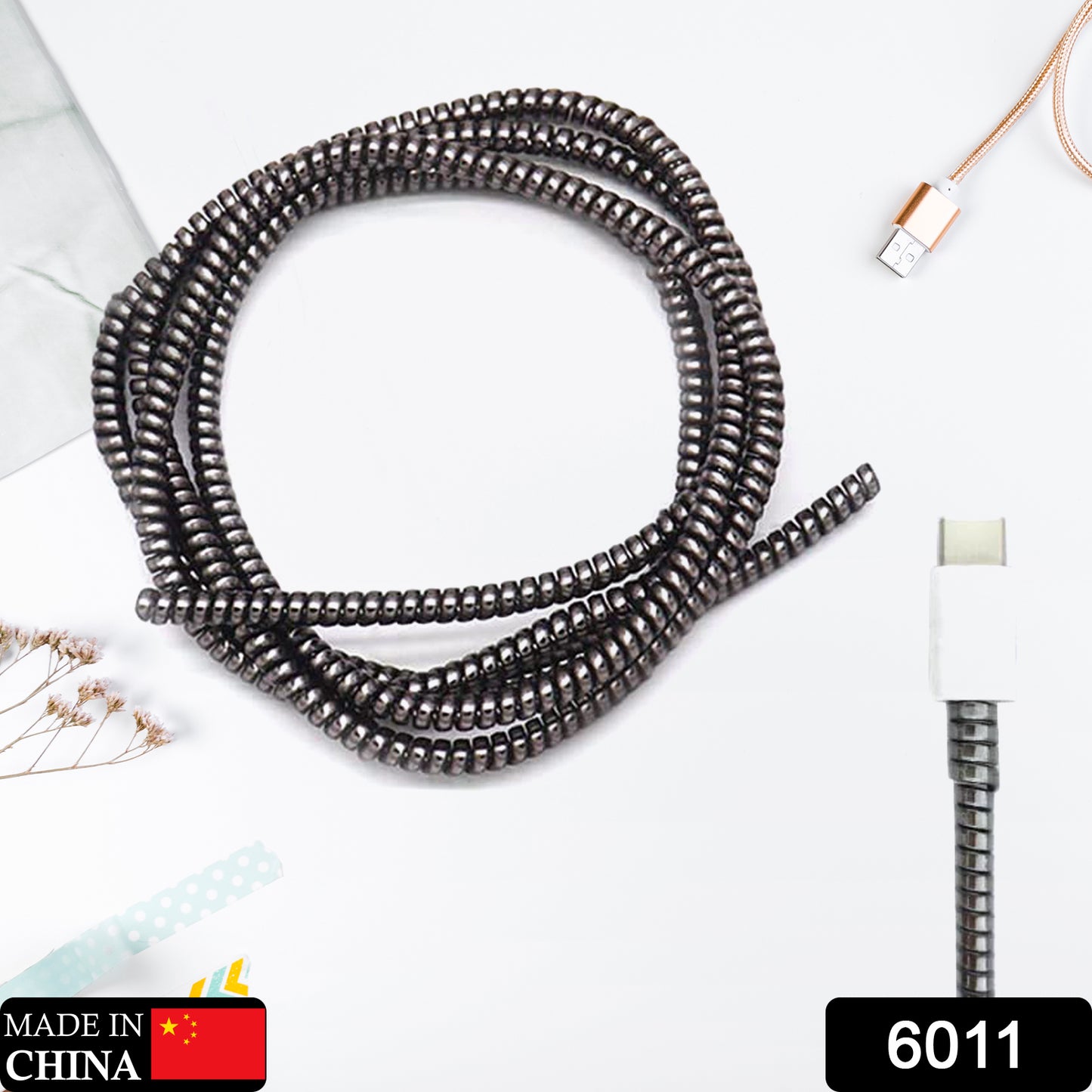 Wukusy Metallic Finish Cable Spiral Protector wrapping Mac charging cable to prevent damage and improve durability.